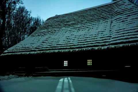 Old shack at night in winter . Stock Photos
