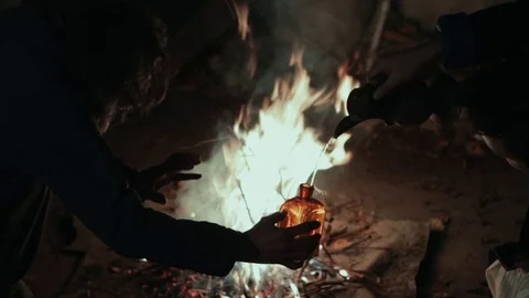 The old shaman dances around the fire Stock Footage 72599904