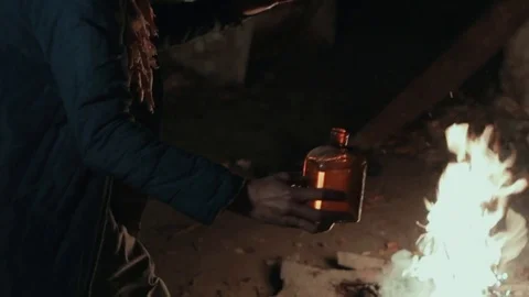 The old shaman dances around the fire Stock Footage 72600332