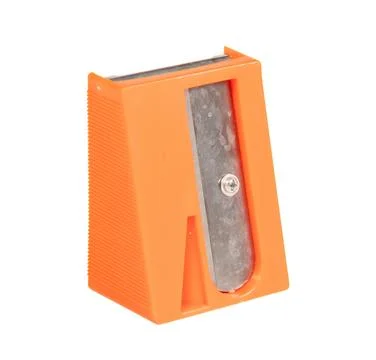 Old sharpner on white background, used in the kitchen for carrots 库存照片