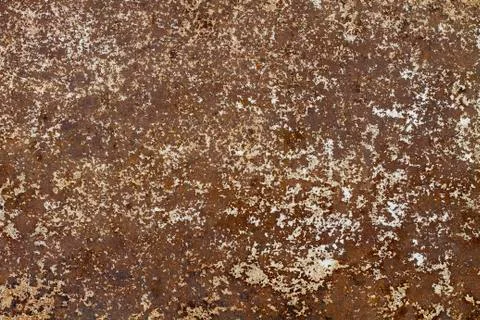 Old sheet of iron covered with rust and corrosion paint. Rust texture. Abstra Stock Photos