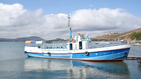 An old Ship on a Lake Sevan in Armenia - Summer Day Stock Footage 116885361