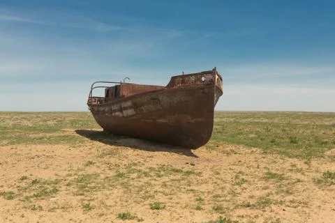 An old ship on land. at the bottom of the dried Aral sea Stock Photos