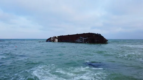 The old ship ran aground on the shore, crashed. Ecological catastrophy. disaster Stock Footage 120473452