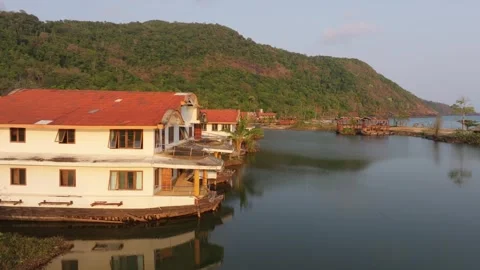 Old ship resort sits idle in sea near Koh Chang sunset, Thailand Stock Footage 310055260