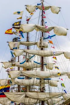 Old ship with three masts with the sails picked up Stock Photos