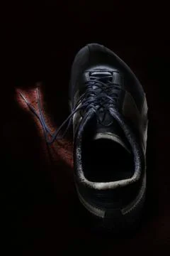 Old shoes in the light Foto stock