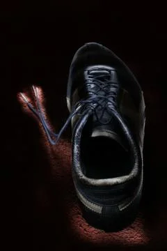 Old shoes in the light Stock Photos