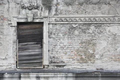 Old shutters on old building Stock Photos