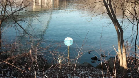 Old sign by the riverfront in the Mon River Video stock 230163340