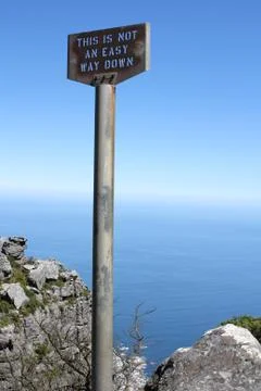 Old signpost on table mountain Stock Photos