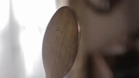 Old Silver makeup mirror vintage held by a woman's hand in red varnish. Blurred Stock Footage 110771246
