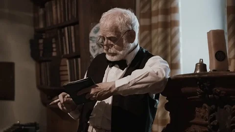 An old singer works in his creative studio, a textured writer in stylish retro Stock Footage 99053583