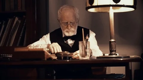 An old singer works in his creative studio, a textured writer in stylish retro Stock Footage 99053599