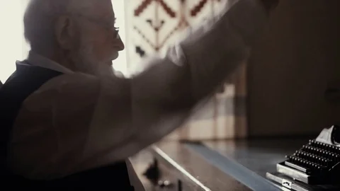 An old singer works in his creative studio, a textured writer in stylish retro Stock Footage 99053631