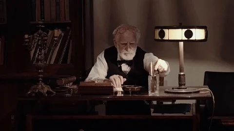 An old singer works in his creative studio, a textured writer in stylish retro Stock Footage 99053687