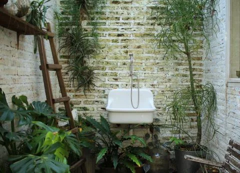 Old sink on brick background Stock Photos