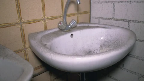 Old sink full of dust 動画素材 79602761