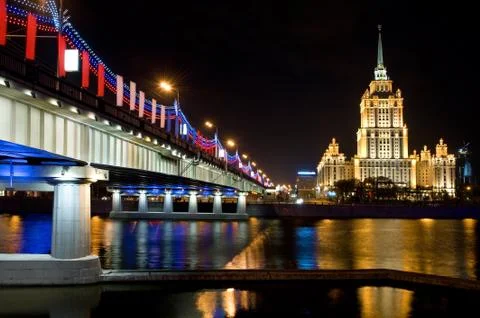 Old skyscraper and bridge Stock Photos