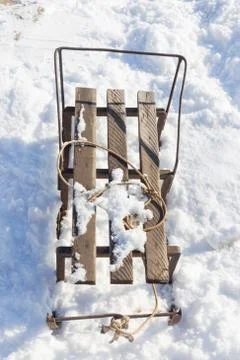 Old sled on snow Stock Photos