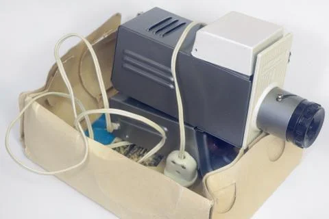 Old slide projector in a box Stock Photos