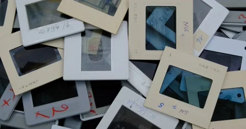 Old slides with plastic frame on a rotating table Stock Footage 239302838
