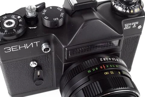 Old SLR camera on a white background, isolate, written in Russian "Zenith ET" Stock Photos