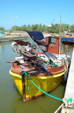 Old small fishing vessels in harbour Stock Photos