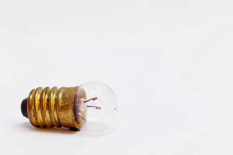 An old small light bulb to experiment on white background Stock Photos