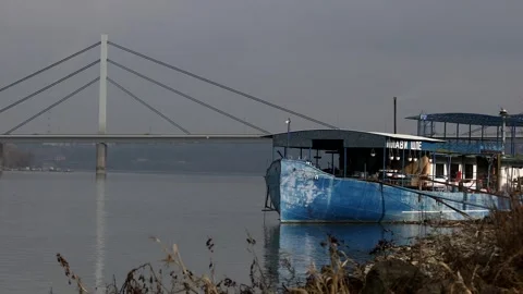 An old small ship on the river bank Video stock 328508266