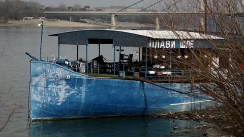 An old small ship on the river bank Video stock 328508267