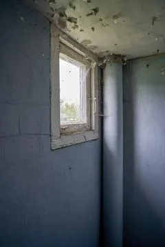 Old small window covered with spider net Fotos de archivo