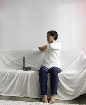 Old smart lady doing activity for relax time at living room Stock Photos