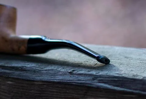Old smoking pipe. Stock Photos