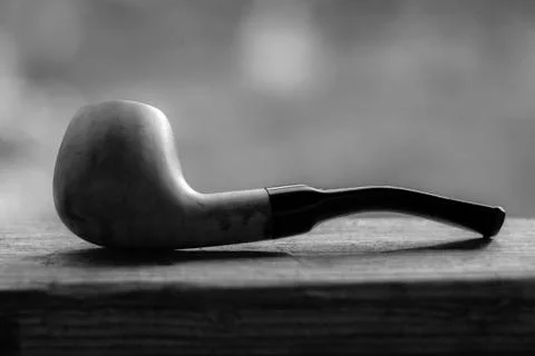 Old smoking pipe. Stock Photos
