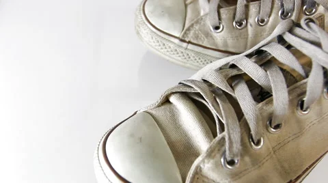 Old sneakers on white background Stock Footage 51470053