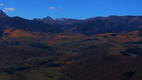 Old Snowmass valley ranch fall autumn sunny blue sky morning Aspen Capitol Peak Video stock 314245388