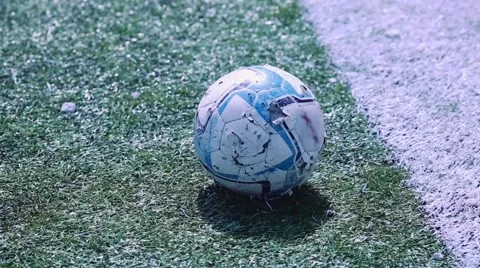 Old soccer ball on the field 動画素材 54744325