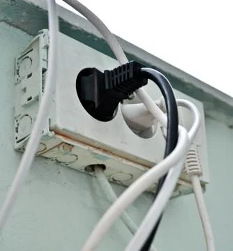 The old socket with three plugs Stock Photos