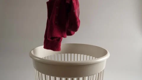 Old socks are thrown into the trash for recycling Stock Footage 260540809