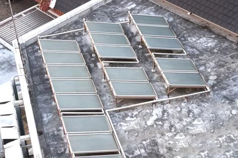 Old solarcell on the rooftop Stock Photos