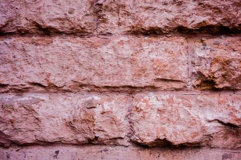 Old but solid brick wall in close up view displaying texture. Foto stock