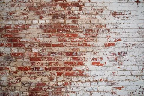 Old, but solid brick wall with whitewash and wear Stock Photos
