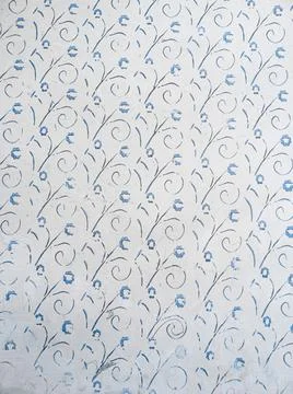 Old Soviet aged white wallpaper on the wall of an abandoned house, textured. Stock Photos