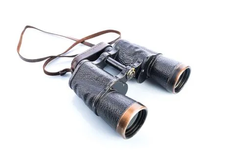 Old Soviet binoculars on white background, reflections and shadows Fotos Stock