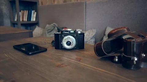 Old soviet camera on table Stock Footage 111837097