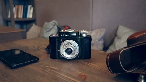 Old soviet camera on table Stock Footage 111837173