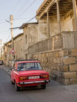Old Soviet car, model Lada 1600, parked on a street in Bukhara Фото