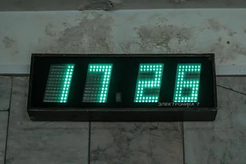 Old Soviet digital wall clock "Elektronika 7". Soviet Russian brand of seven- Stock Photos