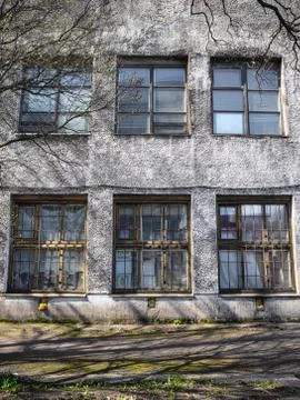 Old soviet facade with some vintage windows Stock Photos